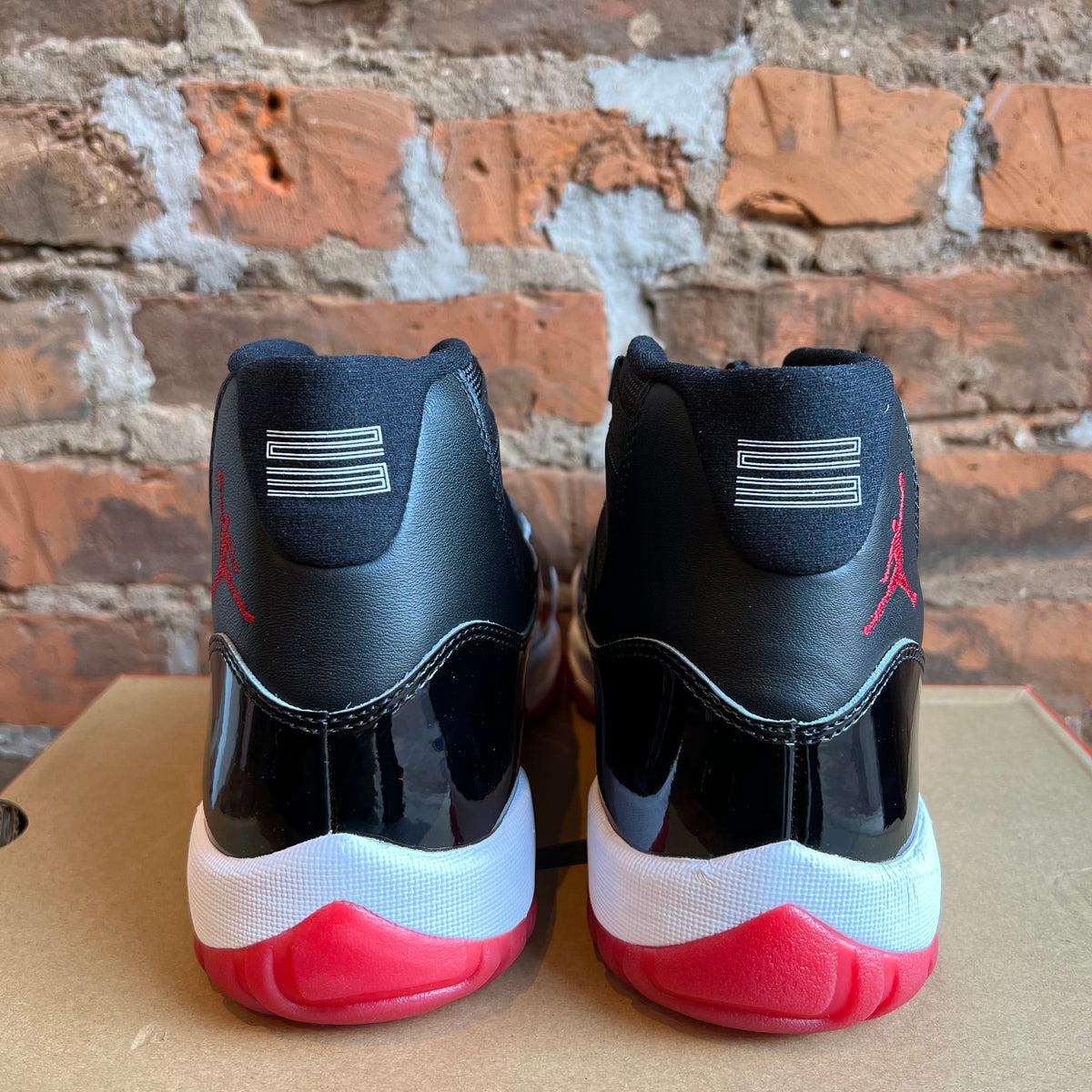 Jordan 11 hot sale bred high